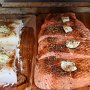 Halibut and salmon are basted every 10-15 mins with olive oil and dollops of lemon butter.